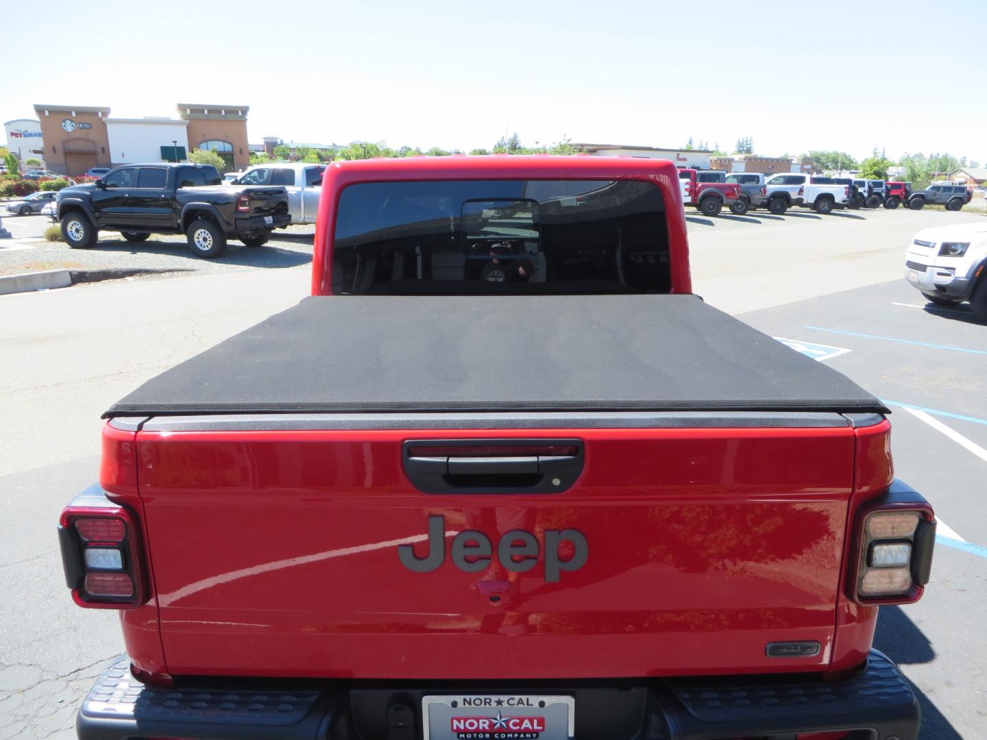 2020 Red /black Jeep Gladiator Rubicon (1C6JJTBG6LL) with an 3.6L V6 DOHC 24V engine, 6M transmission, located at 2630 Grass Valley Highway, Auburn, CA, 95603, (530) 508-5100, 38.937893, -121.095482 - Rubicon Gladiator featuring a Mopar suspension system with Fox shocks, 17" AEV wheels wrapped in 37" BFG tires, Warn Winch, Rock sliders, Cascade front license plate holder, Impact bedliner, Built Right Industries bed Molle panels, and Window tint. - Photo#12